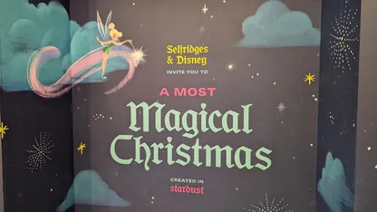 A sign for a magical Christmas event sponsored by Selfridges and Disney