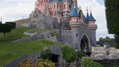 Sleeping Beauty Castle at Disneyland Paris on a cloudy day