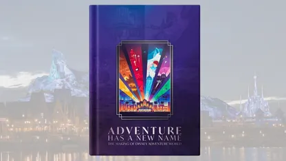Book titled “Adventure Has an Name: The Making of Disney Adventure World” featuring colourful theme-park artwork.