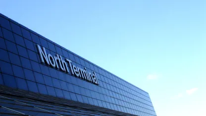 Exterior of North Terminal building at Gatwick Airport with blue sky in the background