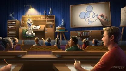 Students in an animation classroom watch a hand draw Mickey Mouse on a large screen.
