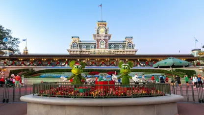 A Christmas scene at the Magic Kingdom in Disney World with Mickey and Minnie Mouse