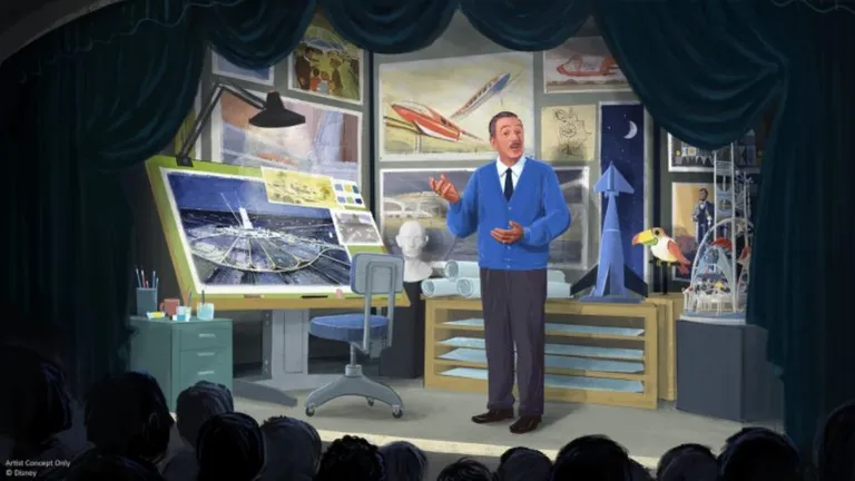 Presenter in a design studio with aircraft drawings and a model rocket on display.
