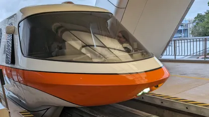 High-speed train front arriving at a station platform