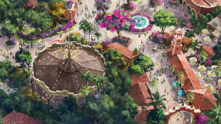 Aerial view of a colorful tropical theme park with gardens, pathways, and a central fountain.