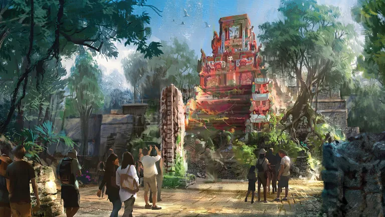 People gather in a lush jungle clearing to admire a colorful ancient temple ruin.