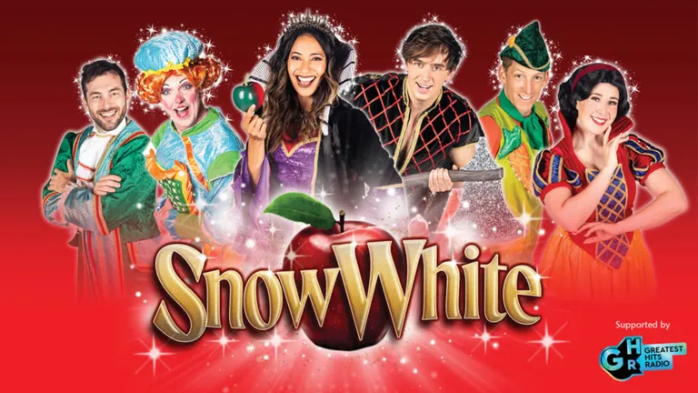 Snow White pantomime cast in colourful costumes above the title “Snow White”.