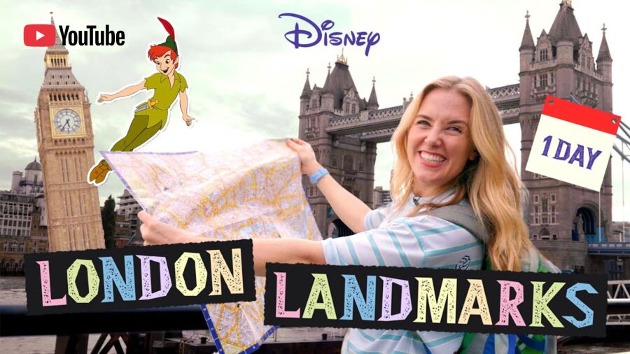 A woman holds a map in front of the London skyline, including Big Ben