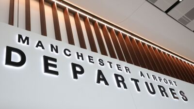 A sign at Manchester Airport that reads 