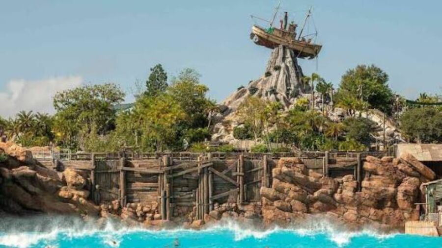 Splash Mountain at Disney World with a pirate ship on top of a hill