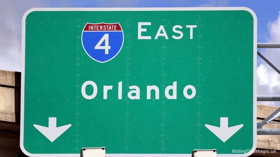 green road sign saying Orlando