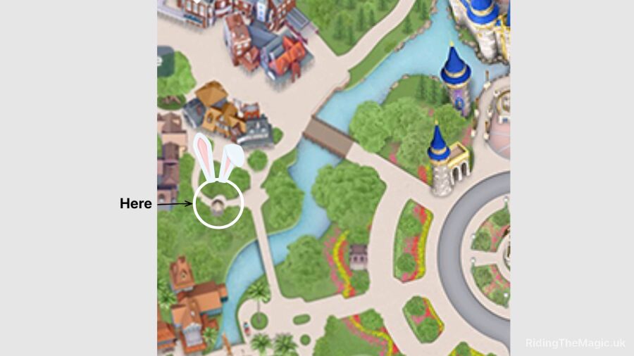 A map of a theme park with a bunny and a castle in the background