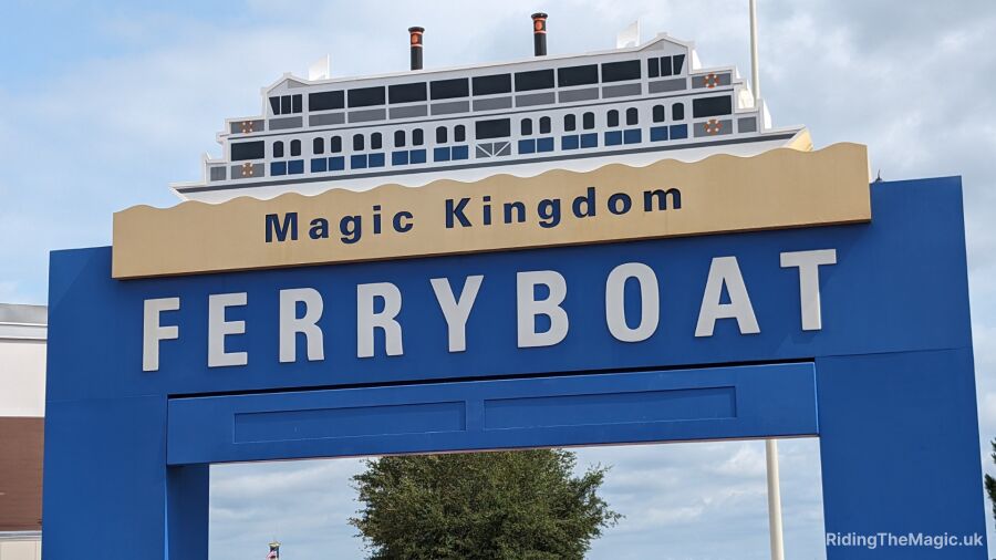 Magic Kingdom Ferryboat entrance sign with a model ship on top