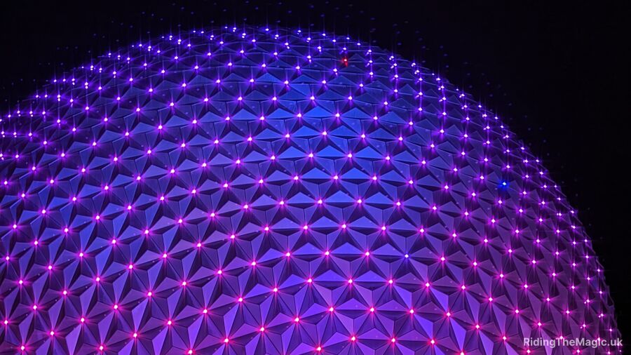 Purple sphere with geometric shapes and lights at Epcot at Walt Disney World