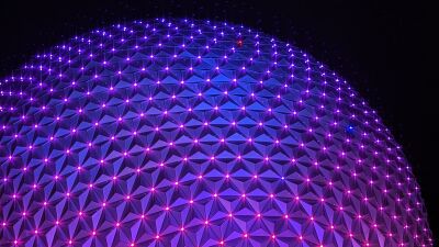 Purple sphere with geometric shapes and lights at Epcot at Walt Disney World