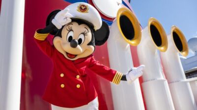 A person dressed as Minnie Mouse in a sailor's uniform