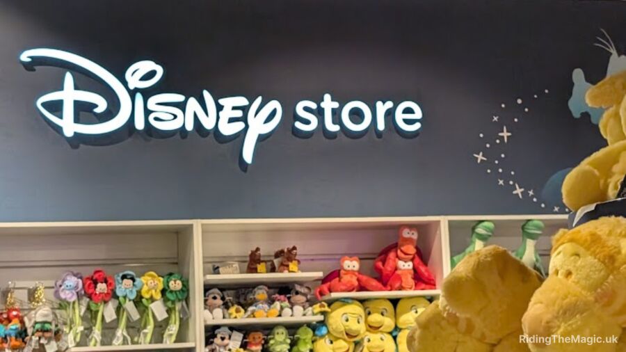 Disney Store with shelves of toys and a sign that says Disney Store