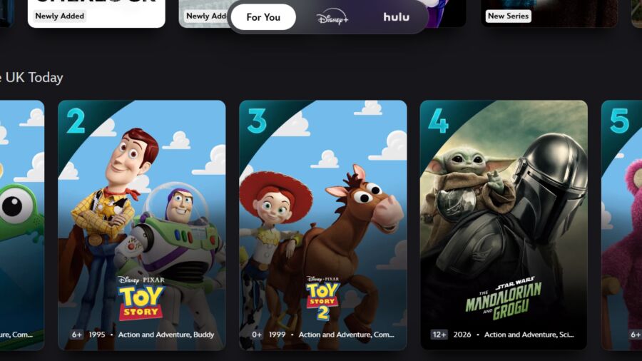 Disney+ streaming service showing Toy Story, Toy Story 2, and The Mandalorian on the screen