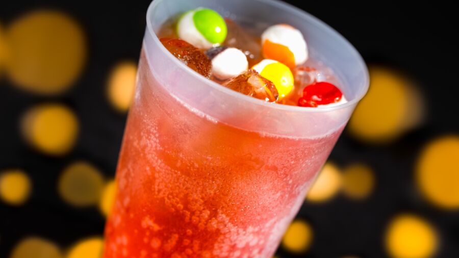 A drink with colorful candies in it