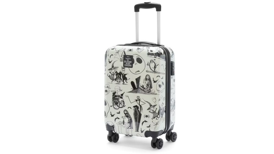 A black and white suitcase with a Nightmare Before Christmas theme on it