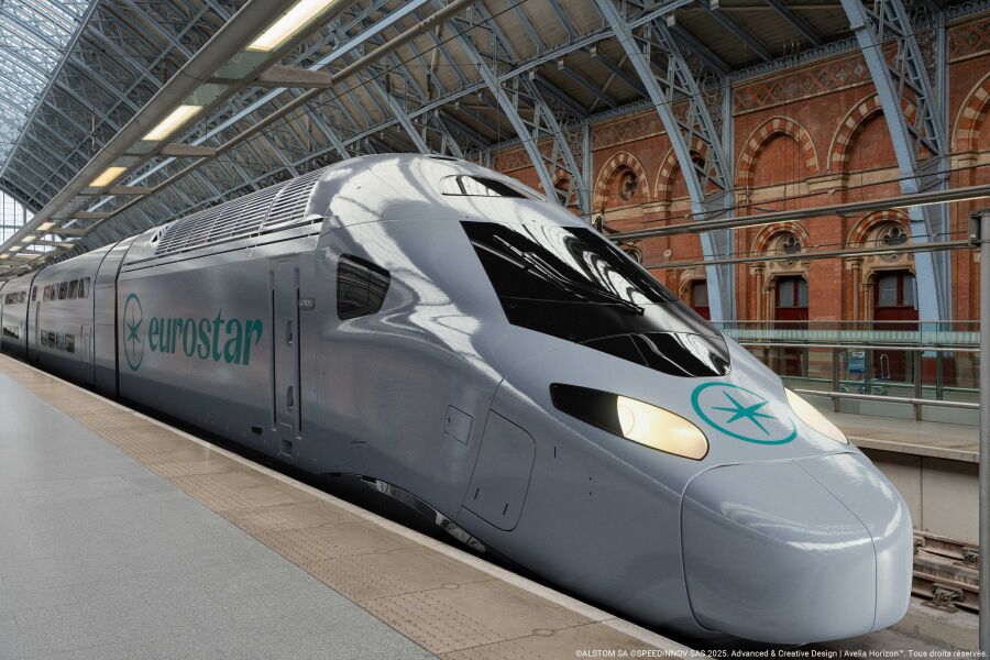 Eurostar train at a station with a modern design and a logo on the front